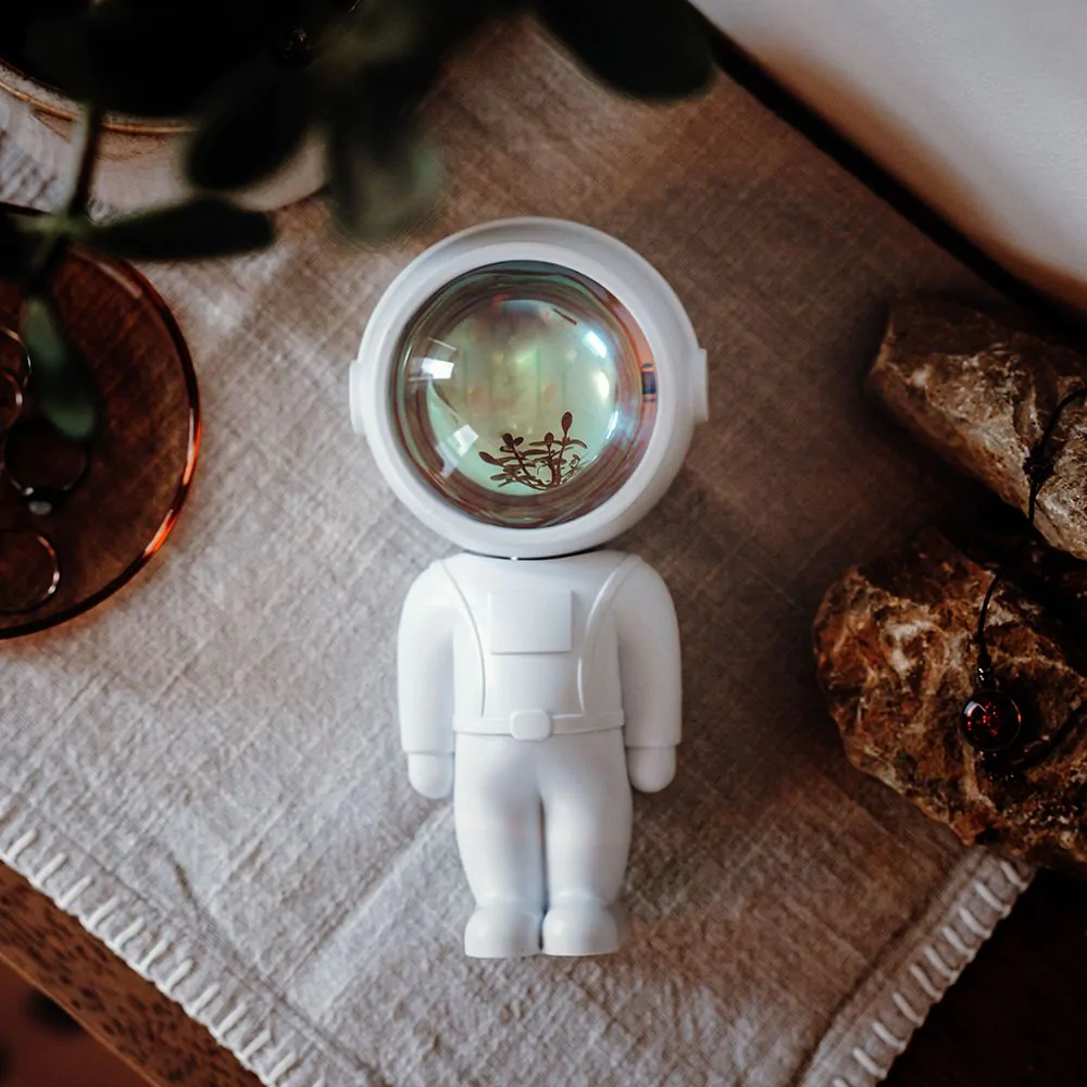 Lampe astronaute avec coucher de soleil